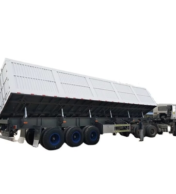 CIMC Tri axle Side Tipper 70 Tons memungkinkan barang untuk diunggah dari sisi mengangkut bahan bangunan dump semi trailer